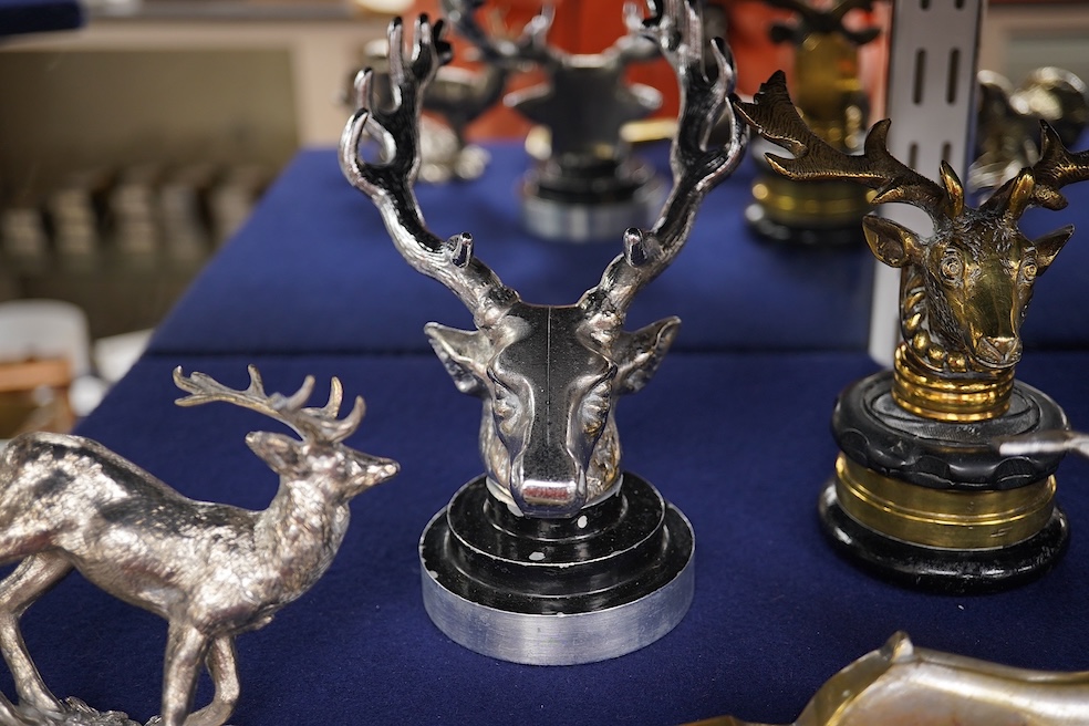 Five chrome and brass car radiator mascots; three in the form of stags’ heads, a stag standing on an oak branch and an Art Deco leading gazelle. Condition - fair, some losses to chrome plating.